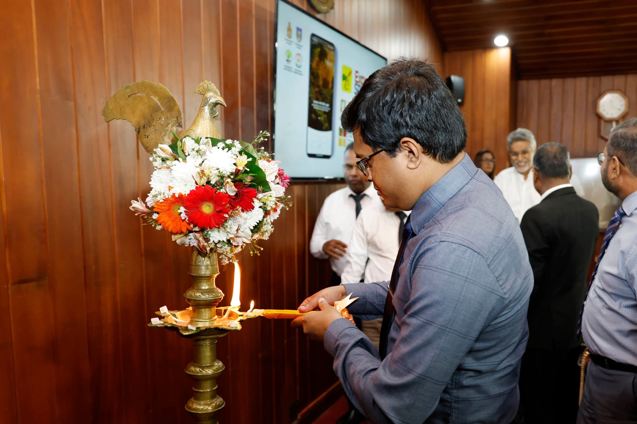CEO lighting the traditional lamp at ExpoSpice launch ceremony