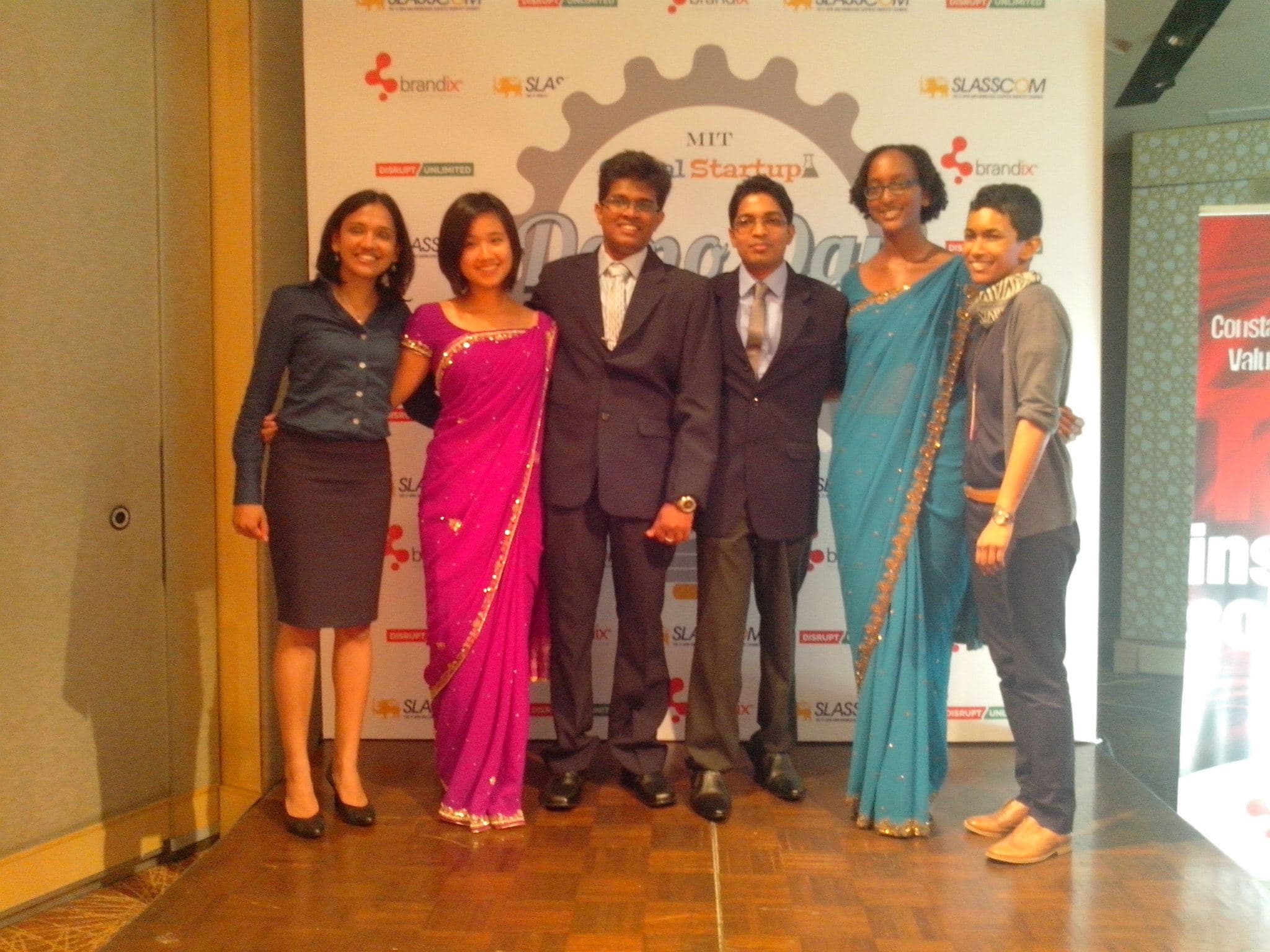 Team photo with MIT trainers and mentors at Demo Day 2014